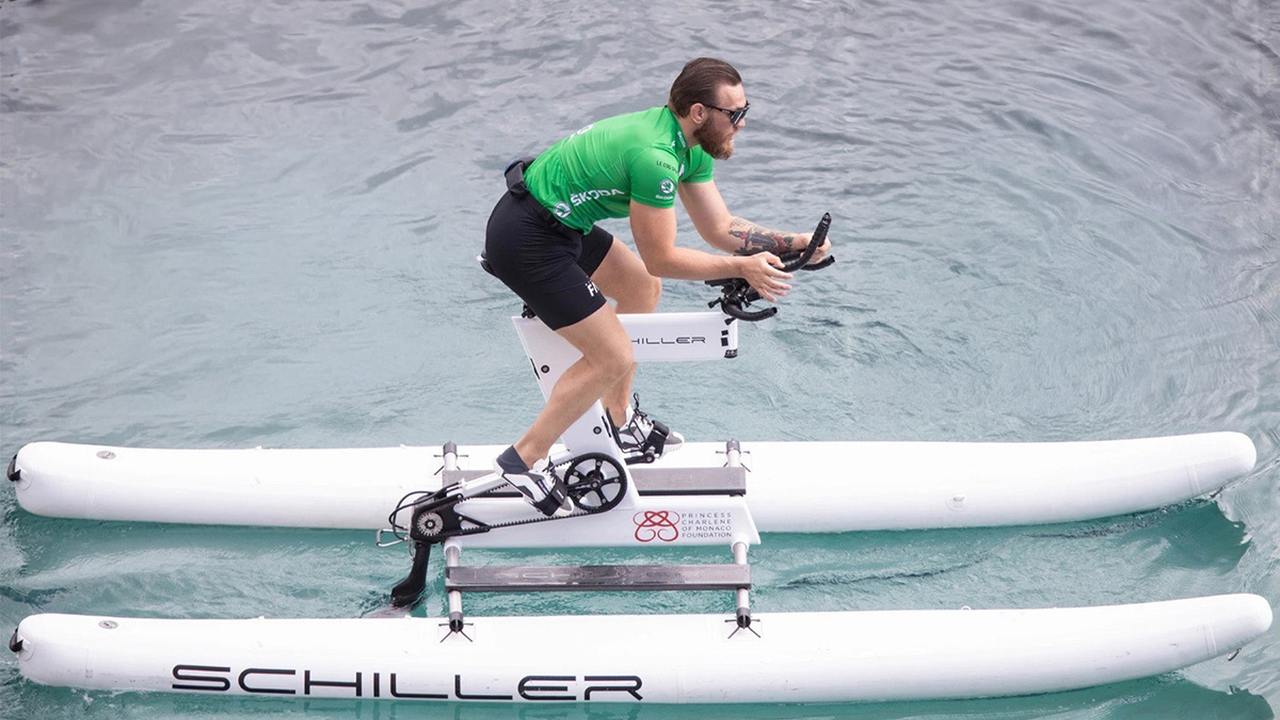 Schiller S1-C view sideways with cyclist in action